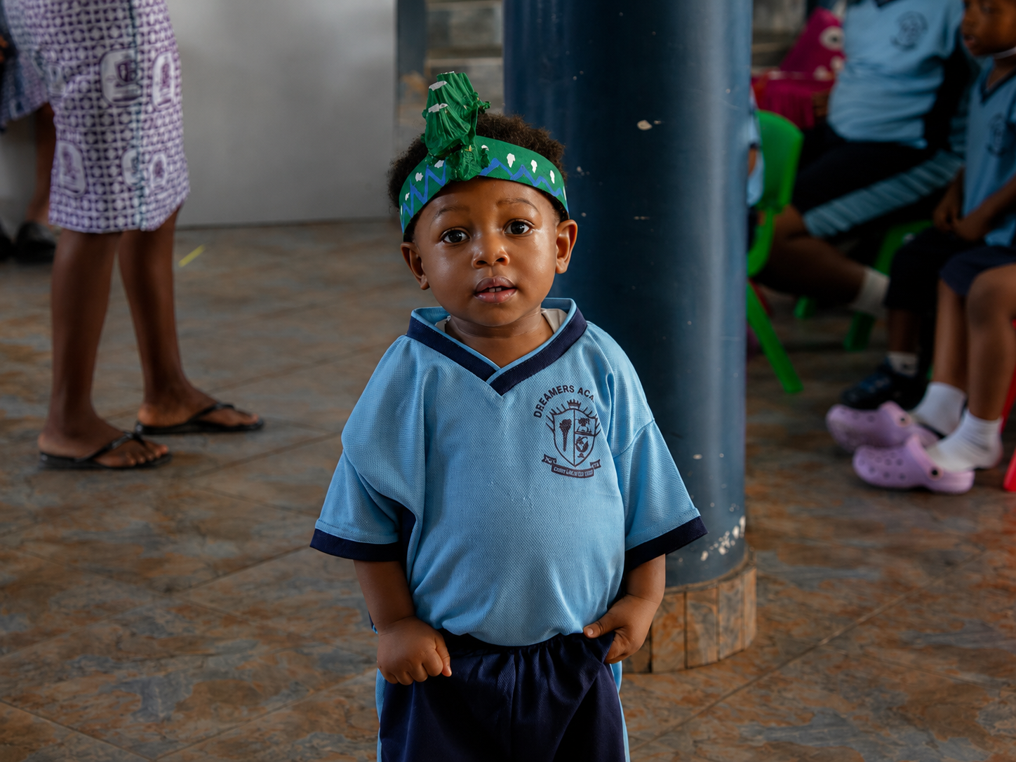Young children playing and discovering in a bright, colourful nursery