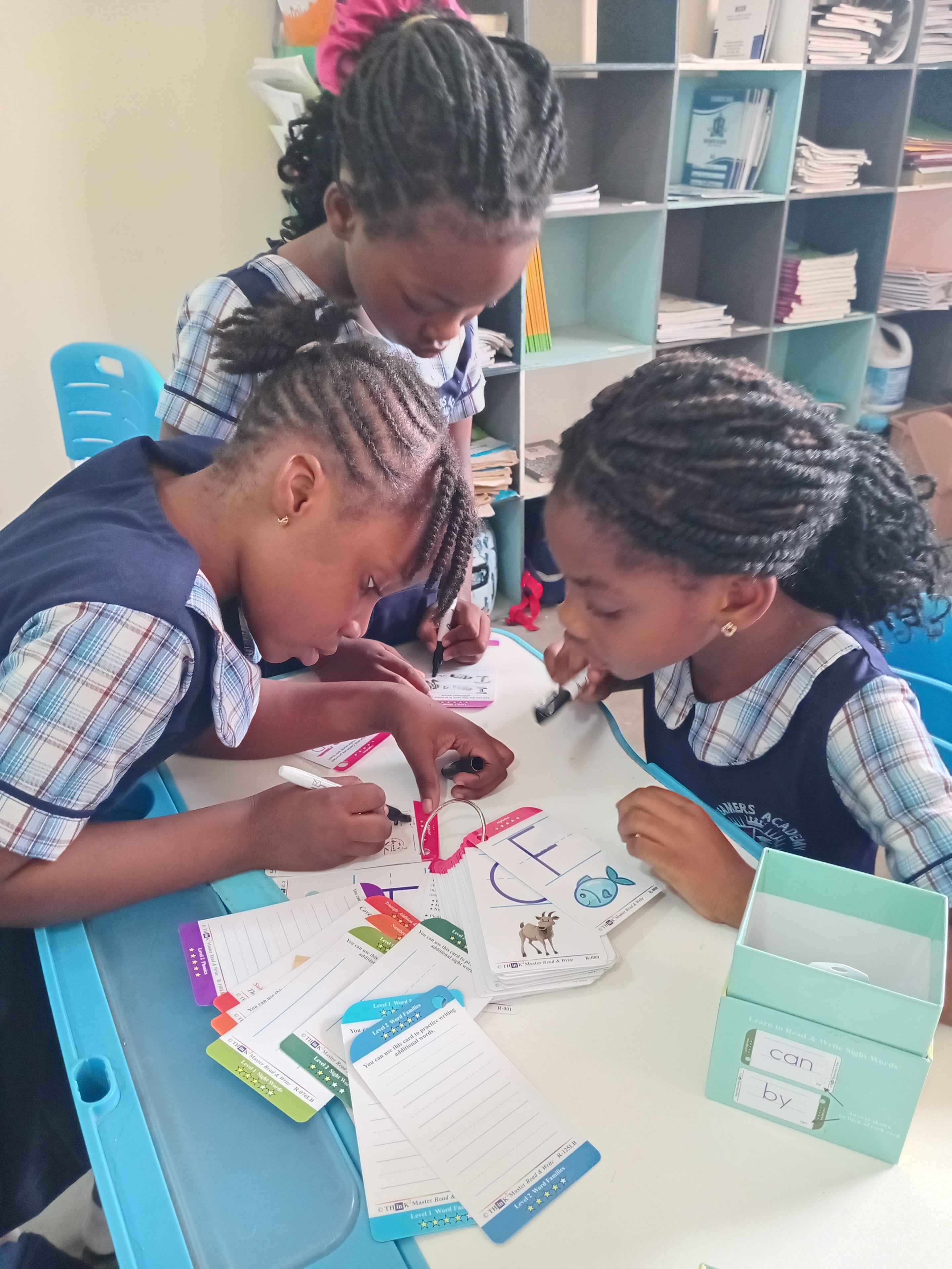 Secondary school students engaged in collaborative study