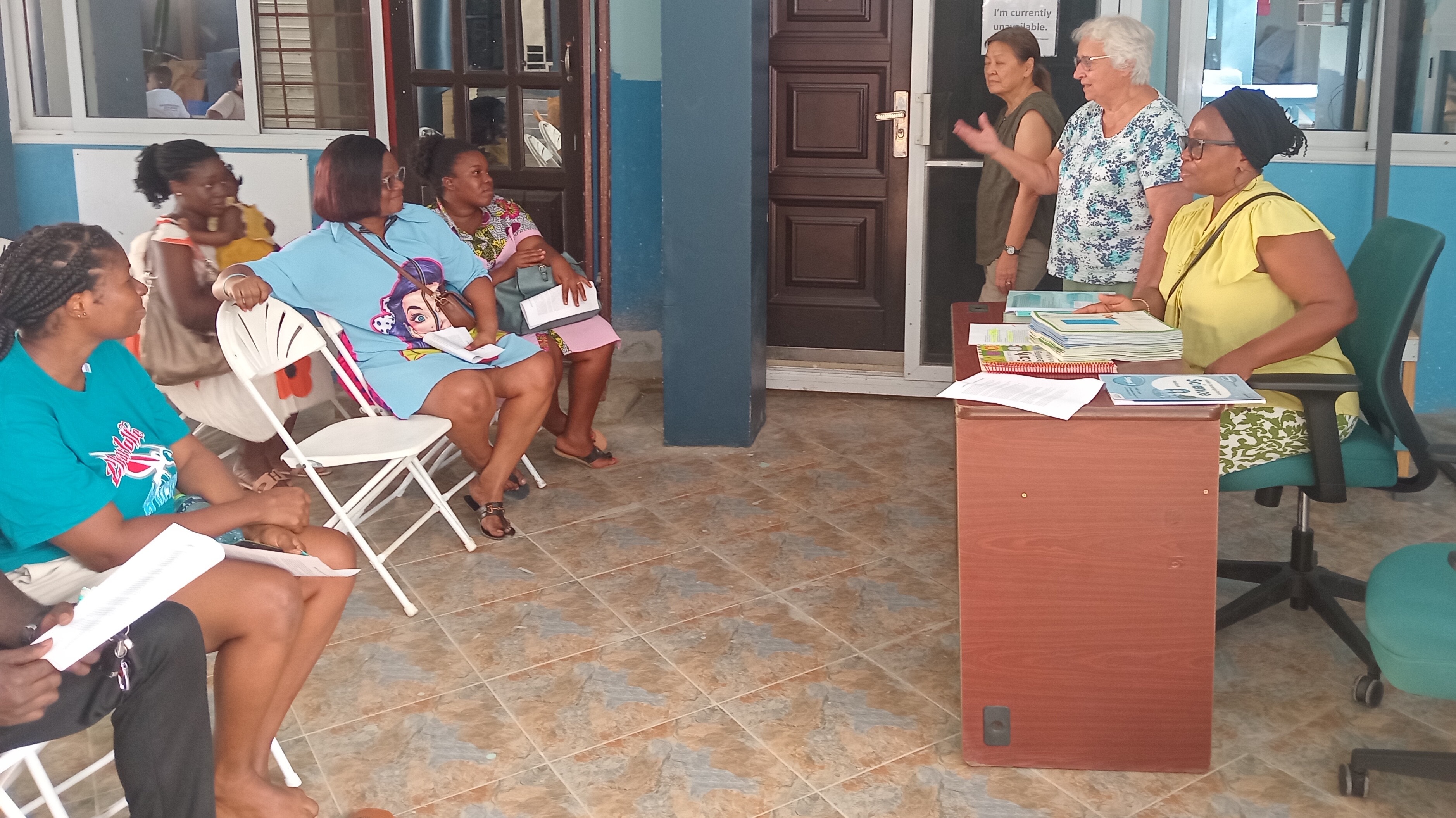 Students getting homework help from a tutor